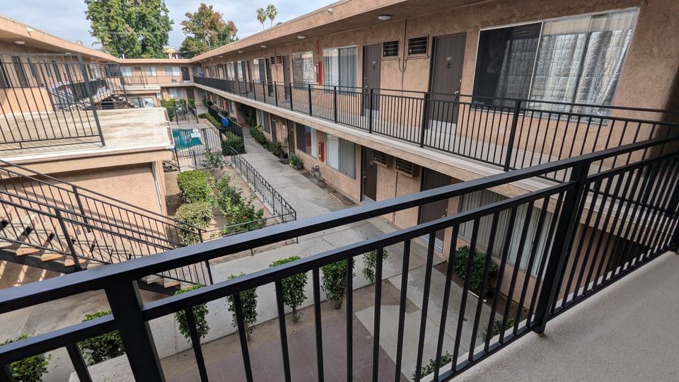 Van Nuys walkway repair with railing replacement